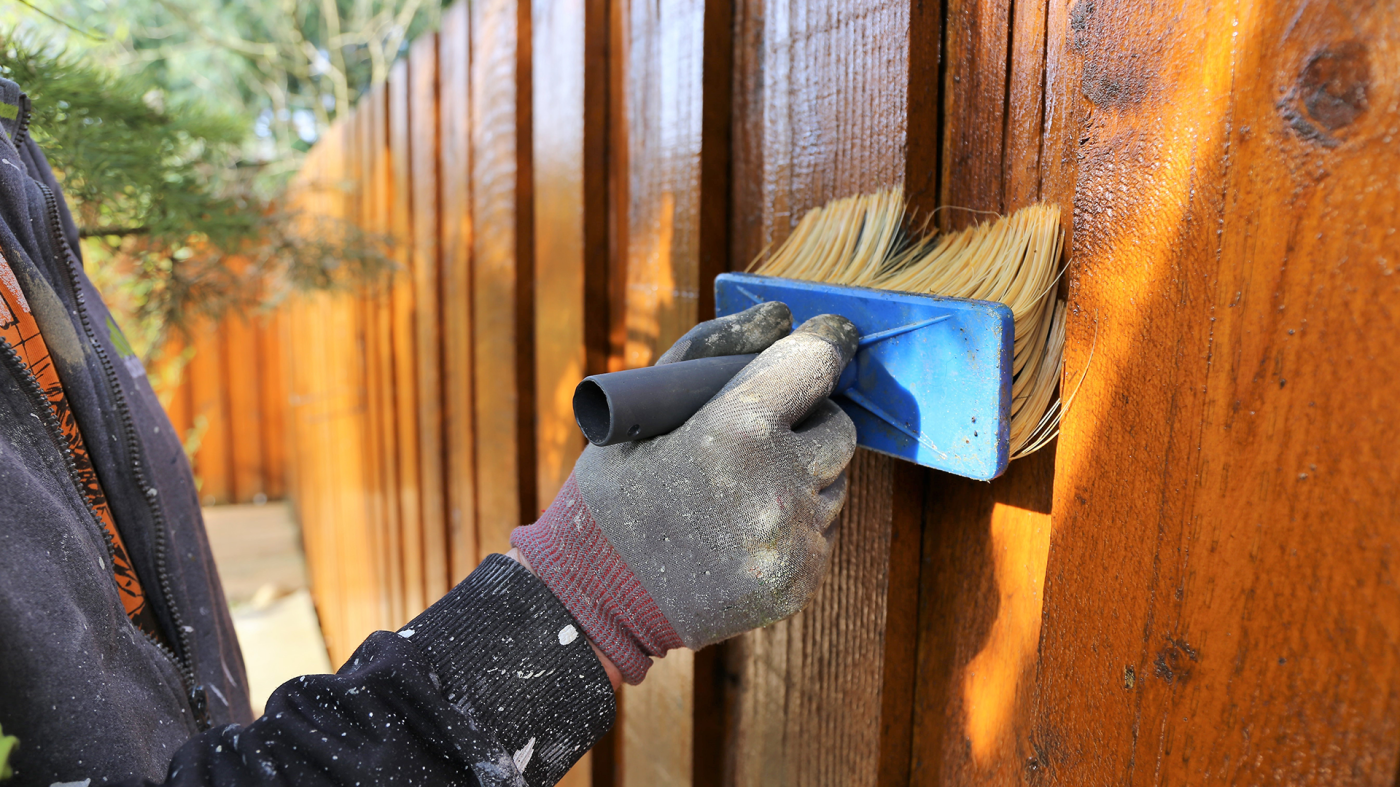 Fence staining project in Sioux Falls